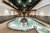 Die Bildergalerie Moderner Wellnesspool mit Wasserfontäne und Holzverkleidung im Innenbereich