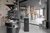 Galleria immagini Tostatrice per caffè e impianti di distillazione in rame in una torrefazione moderna