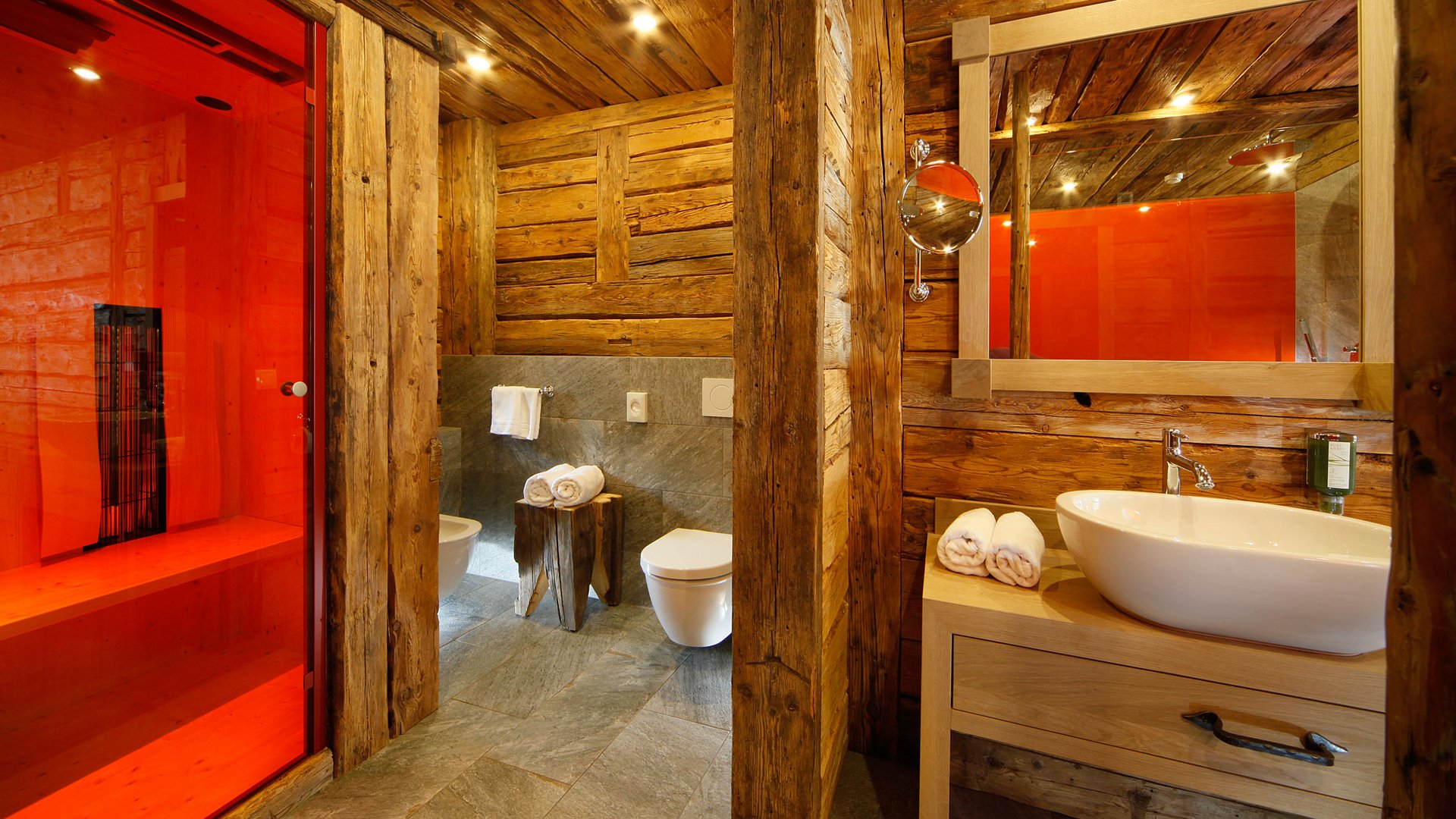 The historical Chalet Gratznhäusl Rustic bathroom with sauna, sink, and wooden details
