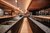 Galleria immagini Bar rusticano con soffitto in legno, banconi in granito, bicchieri e bottiglie