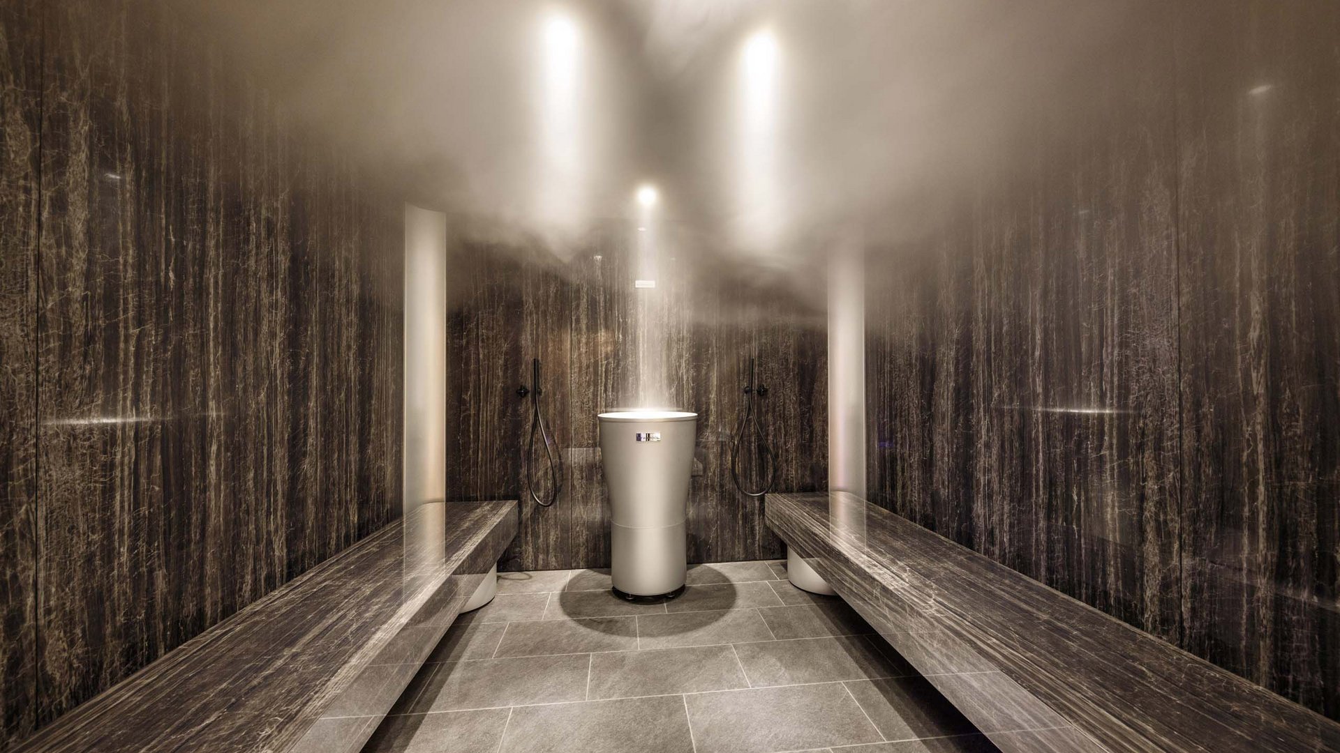 Our sauna realm Modern steam room with brown walls and benches