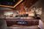 Galleria immagini Bar moderna e illuminata con soffitto in legno, macchina da caffè e area salotto